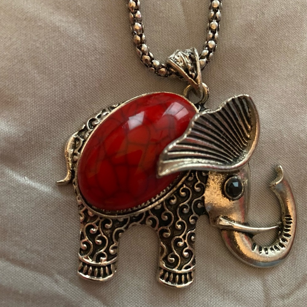 4Pc Red elephant Necklace, earrings and bracelet.